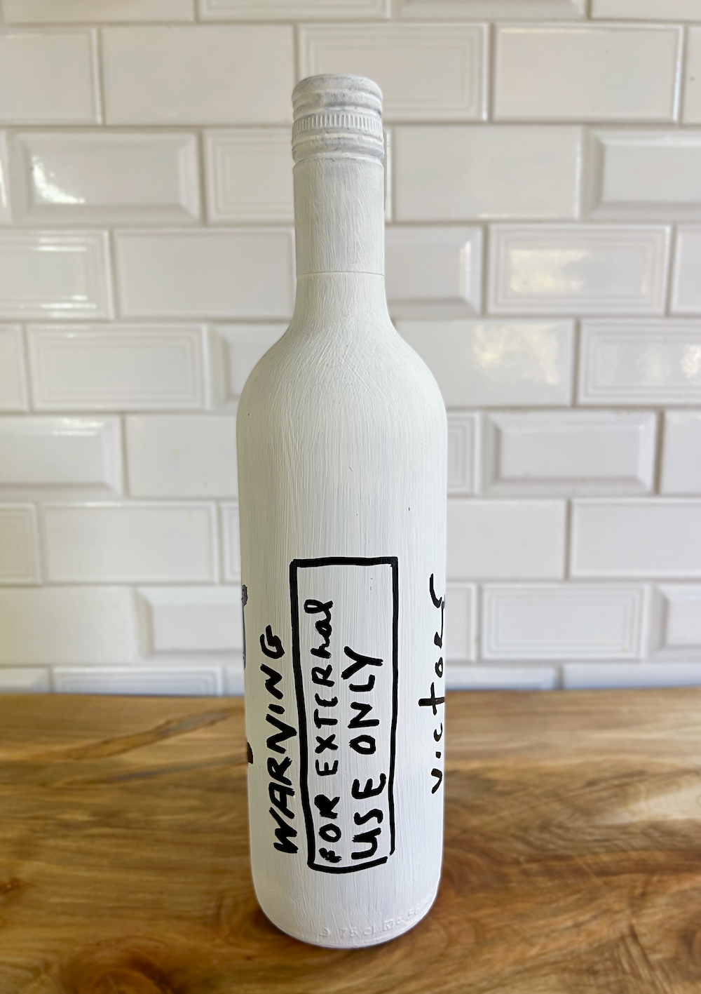 Lies Bottle — back